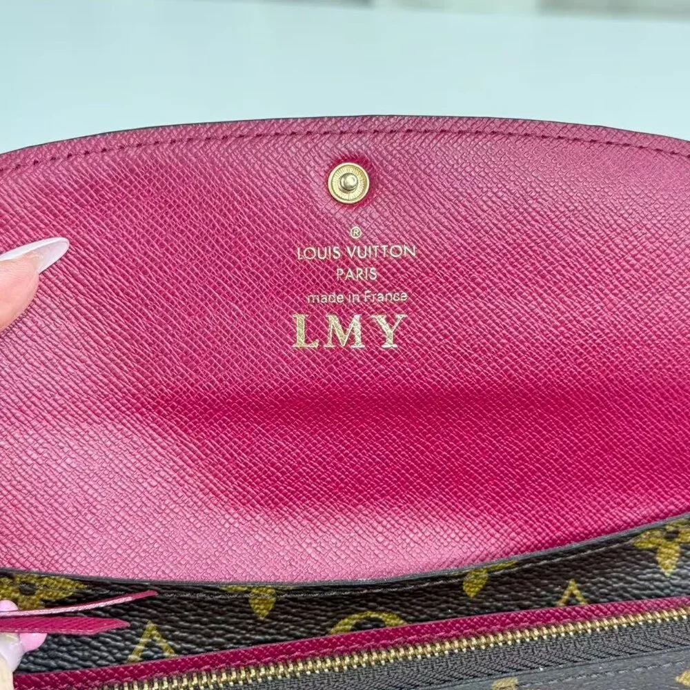 Louis Vuitton Monogram Canvas Wallet with Classic LV Pattern and Red Button